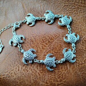 Adult Jewels Silver toned Bracelet with Turtles Linked Bracelet Adjustable